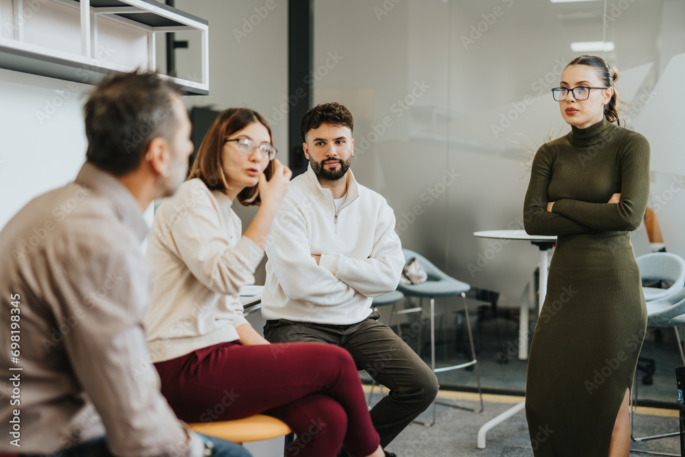 Colleagues collaborate in an evening meeting, discussing ideas and strategizing for business growth and market expansion. Colleagues collaborate in an evening meeting, discussing ideas and strategizing for business growth and market expansion.
