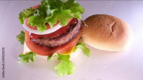 Fresh tasty burger isolated. on black background photo