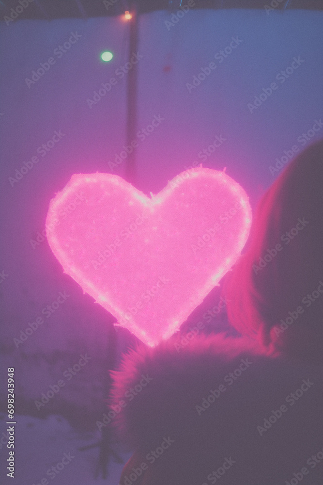 Heart-Shaped Neon Sign Illuminating a Window