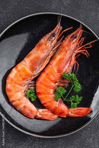 langoustine large gambas shrimp fresh prawn eating cooking appetizer meal food snack on the table copy space food background rustic top view