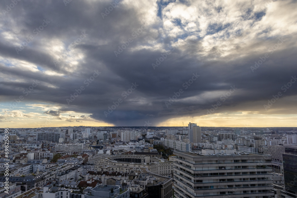 A dramatic photo of an approaching storm in Paris from a high vantage point