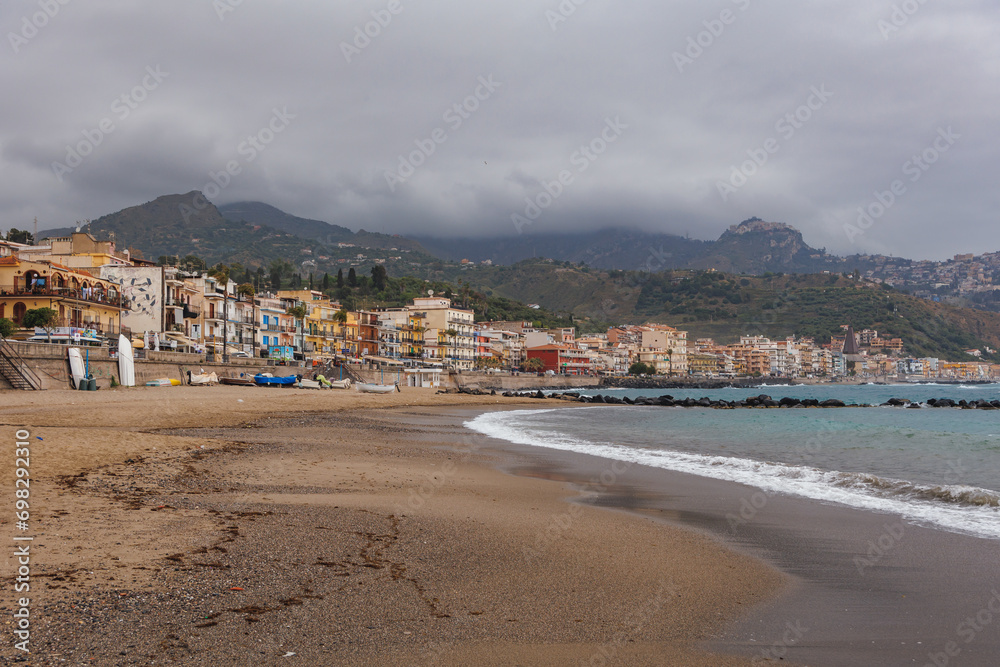 Ionian Sea beach in Giardini Naxos in the Metropolitan City of Messina on the island of Sicily, Italy