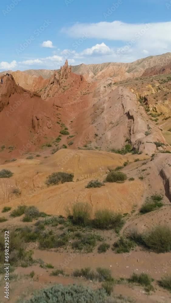 Red Canyon and Blue Sky at Sunny Day. Aerial View. Drone is Flying Forward, Camera is Tilting Up. Establishing Shot. Vertical Video Red Canyon and Blue Sky at Sunny Day. Aerial View. Drone is Flying Forward, Camera is Tilting Up. Establishing Shot. Vertical Video