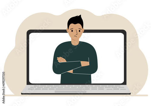Man communicates via videoconference through laptop screen. The concept of online meetings, webinars, remote work or work from home.