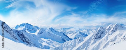 Panorama of snowy mountains in winter photo