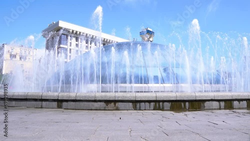 A beautiful fountain in the center of Kiev in summer, hot summer in the city in the afternoon, by the fountain photo