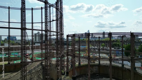 Drone footage of a construction work near urban buildings with London skyline in the background, UK photo