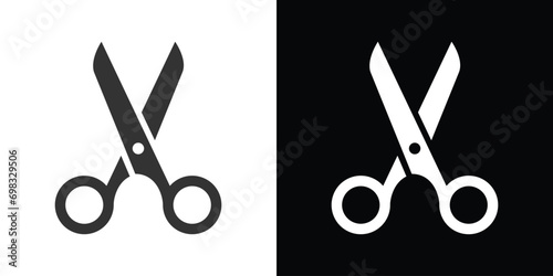 scissors isolated on white and black background photo