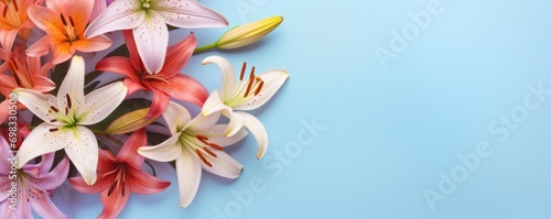 Spring flowers lily. Bouquet of flowers on pastel background. Valentine's Day, Easter, Birthday, Happy Women's Day, Mother's Day. Flat lay, top view, copy space for text