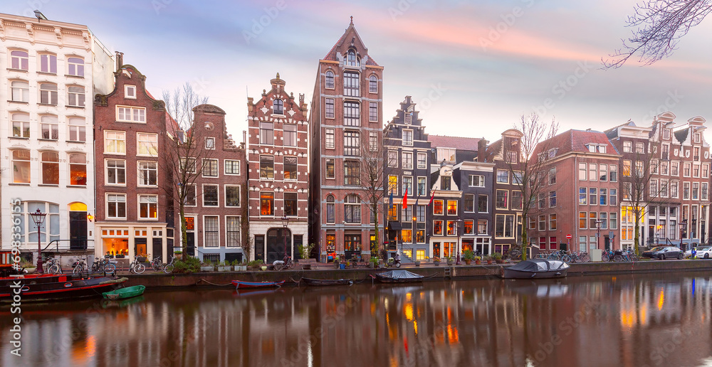 Amsterdam canal Herengracht with typical dutch houses at sunset, Holland, Netherlands. - obrazy, fototapety, plakaty 