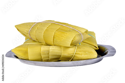 pamonha, corn mush, traditional corn cake culinary brazilian food, side view on white background