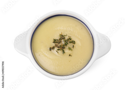 Tasty leek soup in bowl isolated on white, top view
