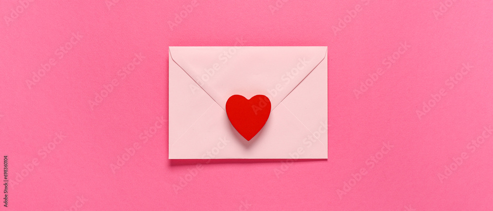 Envelope and red heart on pink background, top view. Valentine's Day celebration Envelope and red heart on pink background, top view. Valentine's Day celebration