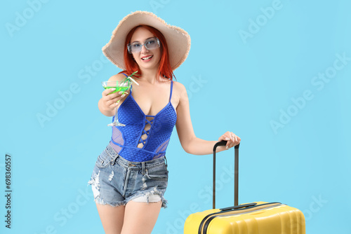 Female tourist with cocktai...