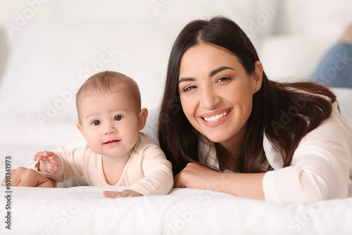 Happy mother with her littl...