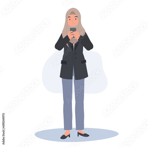 Muslim Businesswoman in Hijab Using Smartphone