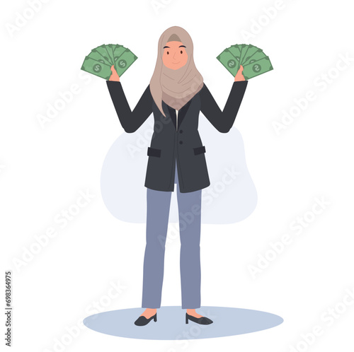 Financial Success concept. muslim Woman in Hijab Holding Money Fan in both hands.