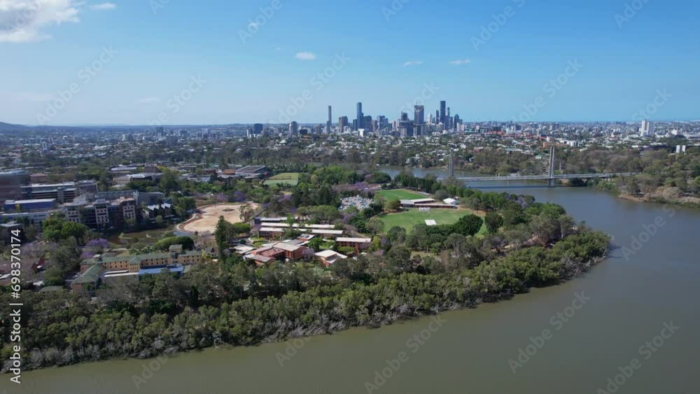 Playing Fields On The Banks Of Brisbane River Near Eleanor Schonell Bridge In Queensland, Australia. aeria panning shot Playing Fields On The Banks Of Brisbane River Near Eleanor Schonell Bridge In Queensland, Australia. aeria panning shot