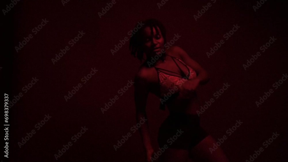 Slow motion of woman dancing alone Slow motion of woman dancing alone
