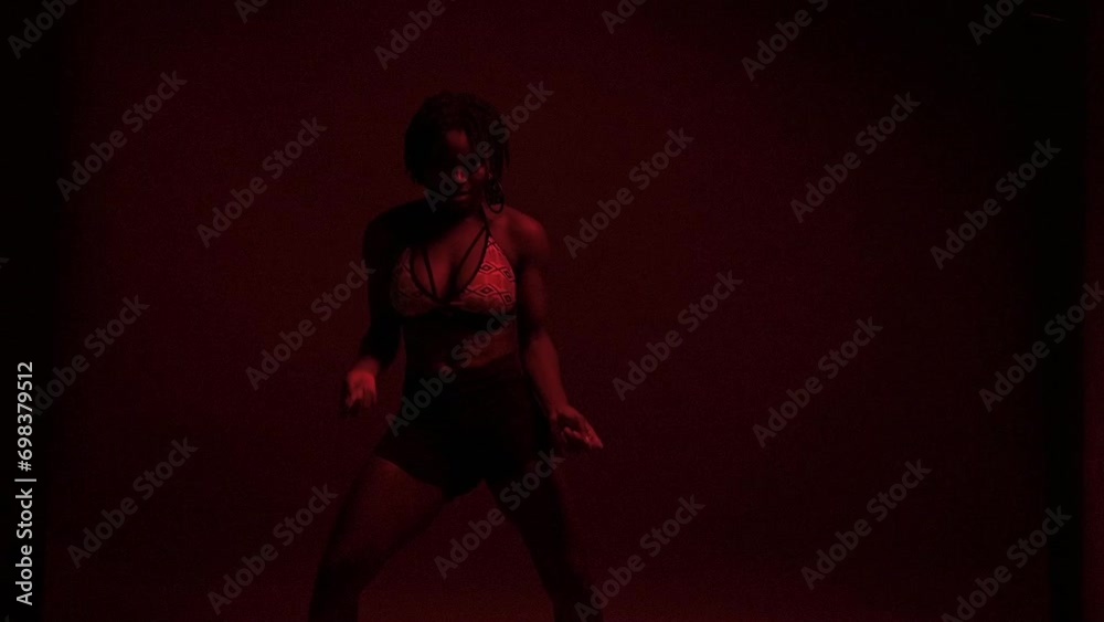 Slow motion of vibrant and moody woman dancer at studio Slow motion of vibrant and moody woman dancer at studio