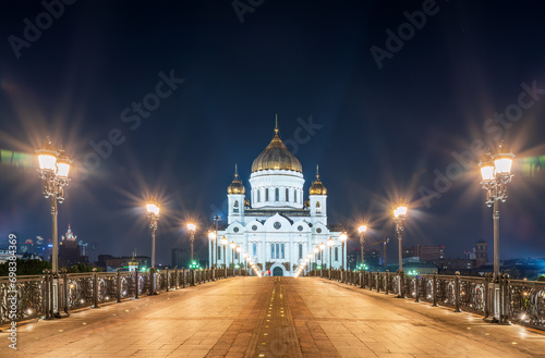 Cathedral of Christ the Savior and Patriarshy bridge at night in Moscow, Russia