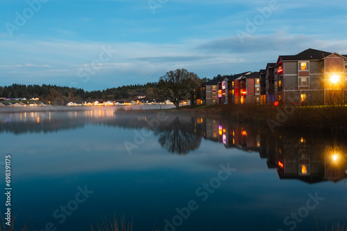 Turner Lake lights reflections in dusk in Turner, Oregon