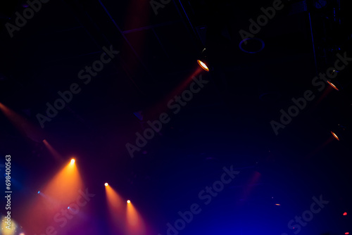 Colorful spot lights in smoke, stage illumination