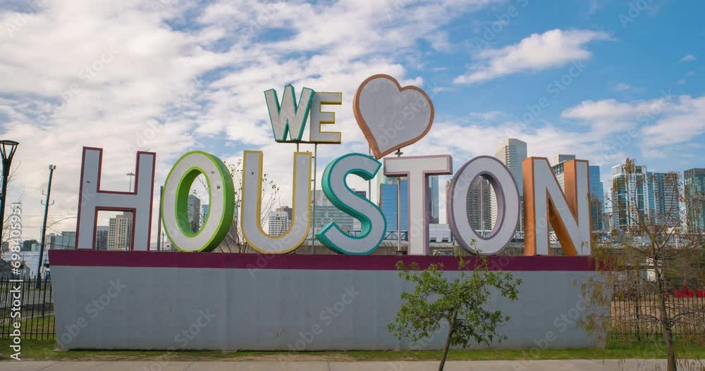 Time lapse of cloudy sky over the 'We Love Houston' Sign in Houston, Texas Time lapse of cloudy sky over the 'We Love Houston' Sign in Houston, Texas