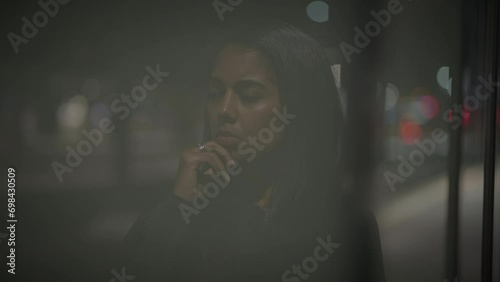 Head Shot of Thinking Female Person Waiting Thoughtful in Trainstation  photo
