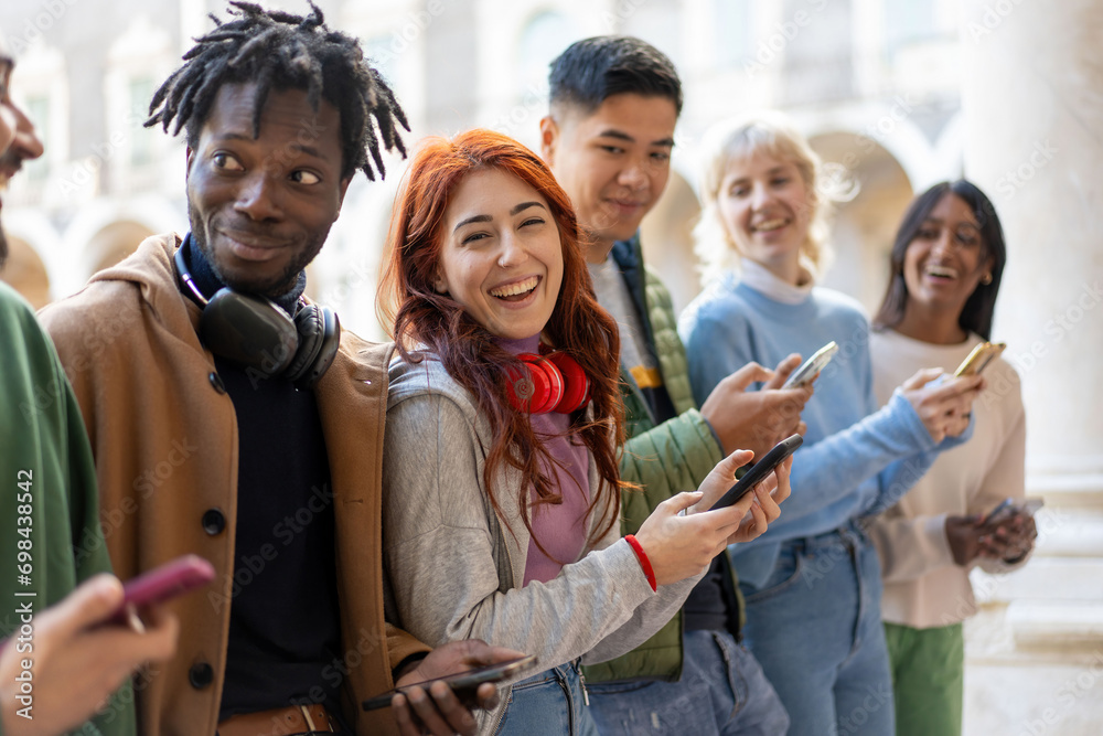 Young Friends Sharing Content on Smartphones Young Friends Sharing Content on Smartphones