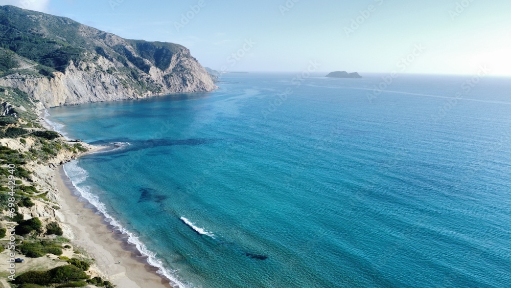 Aerial view of the tranquil sea and coastal cliffs. Zakynthos, Kalamaki Aerial view of the tranquil sea and coastal cliffs. Zakynthos, Kalamaki