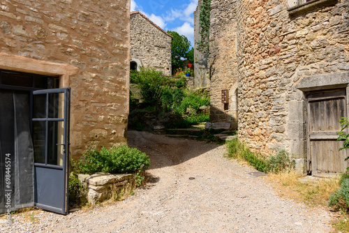 Fototapeta Naklejka Na Ścianę i Meble -  The streets of the medieval village in Europe, France, Occitanie, Aveyron, La Couvertoirade, in summer, on a sunny day.