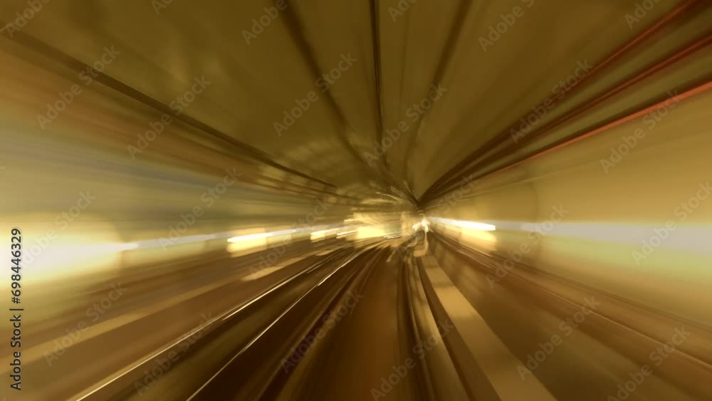 Hyperlapse of automatic train moving to tunnel of metro. Time lapse of motion blurred tube lines in tunnel of automatic train 