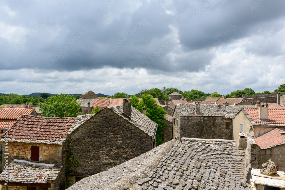 The streets of the medieval village in Europe, France, Occitanie, Aveyron, La Couvertoirade, in summer, on a sunny day.
