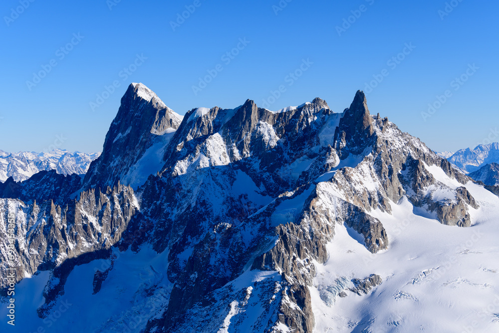 Grandes Jorasses, Dent and Glacier du Géant, Aiguilles Marbrées in Europe, France, Rhone Alpes, Savoie, Alps in winter on a sunny day. Grandes Jorasses, Dent and Glacier du Géant, Aiguilles Marbrées in Europe, France, Rhone Alpes, Savoie, Alps in winter on a sunny day.