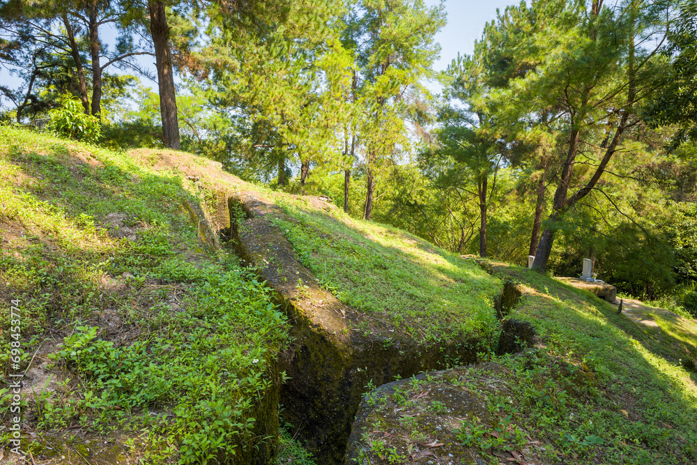 The Beatrice fortified position and its trenches on a green mountain, Asia, Vietnam, Tonkin, Dien Bien Phu, in summer, on a sunny day. The Beatrice fortified position and its trenches on a green mountain, Asia, Vietnam, Tonkin, Dien Bien Phu, in summer, on a sunny day.