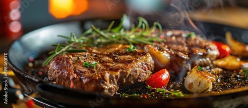 Cook a two-serving steak on a pan with fresh ingredients.