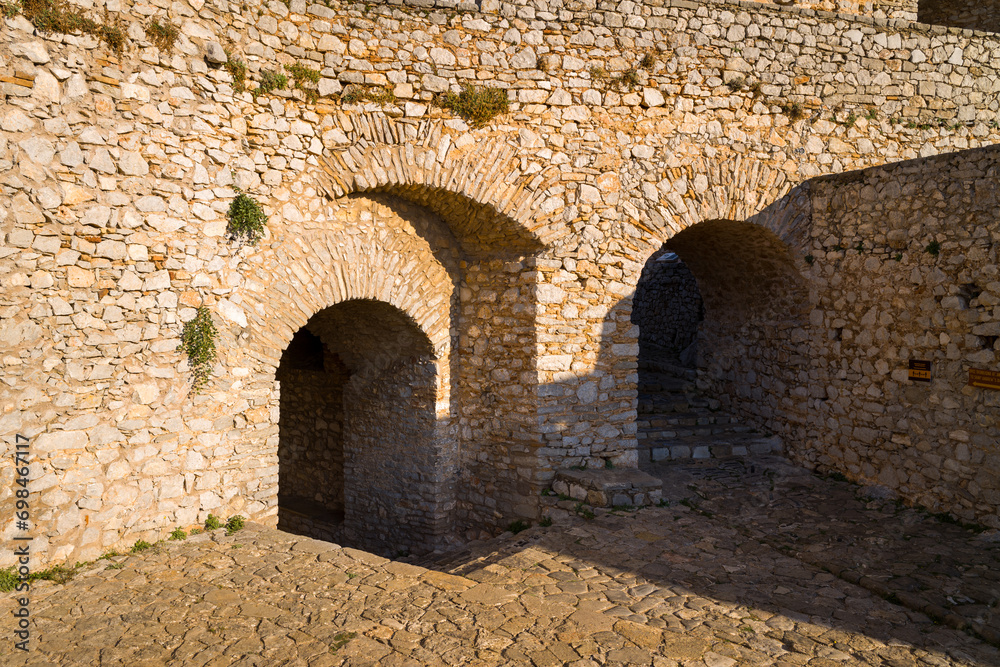 The stone interior of Palamidi fortress , Europe, Greece, Peloponnese, Argolis, Nafplion, Myrto seashore, in summer on a sunny day.