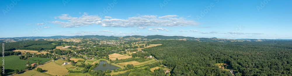 A traditional village old seaside resort in the middle of the countryside in Europe, France, Burgundy, Nievre, Saint-Honoré-les-Bains, towards Chateau Chinon, in summer on a sunny day.