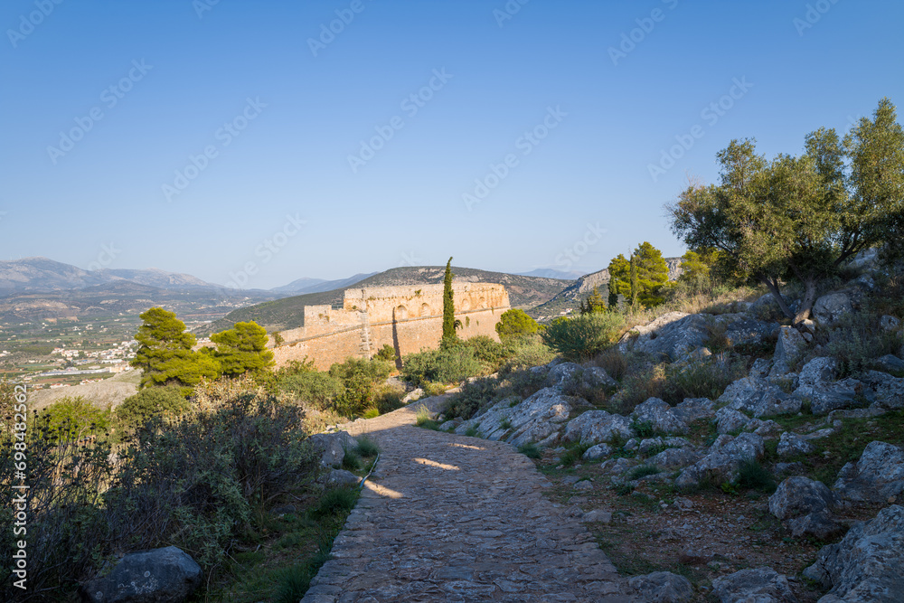 The stone interior of Palamidi fortress , Europe, Greece, Peloponnese, Argolis, Nafplion, Myrto seashore, in summer on a sunny day. The stone interior of Palamidi fortress , Europe, Greece, Peloponnese, Argolis, Nafplion, Myrto seashore, in summer on a sunny day.