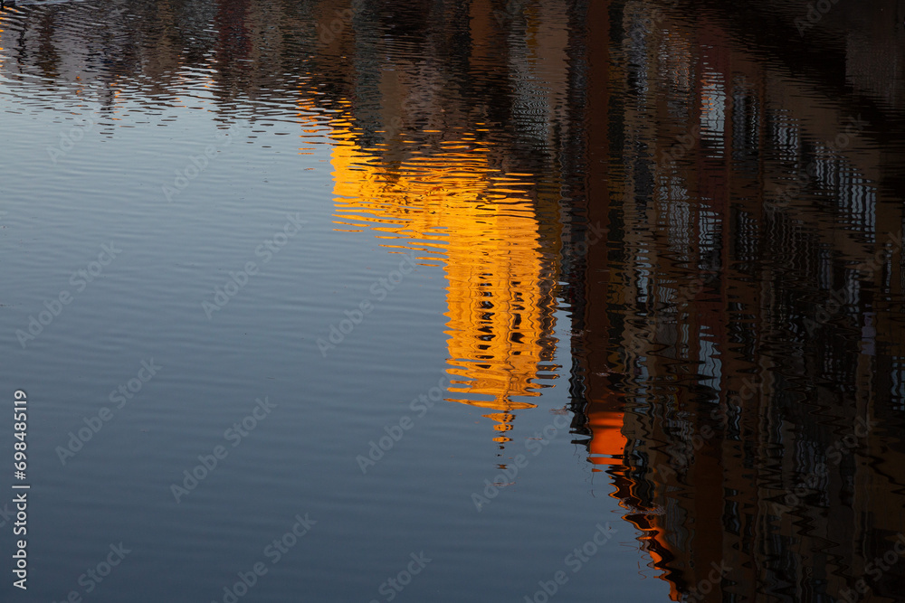 Reflections of the city of Girona on the water of the Onyar River Reflections of the city of Girona on the water of the Onyar River