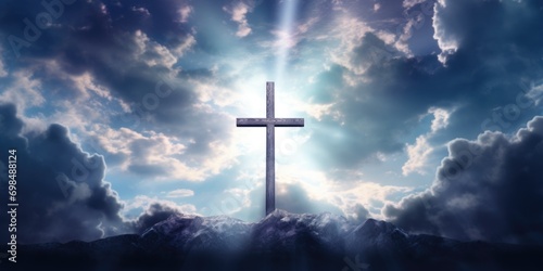 Picture of the holy cross symbolizing death and resurrection of Jesus Christ over sky © Julia Jones