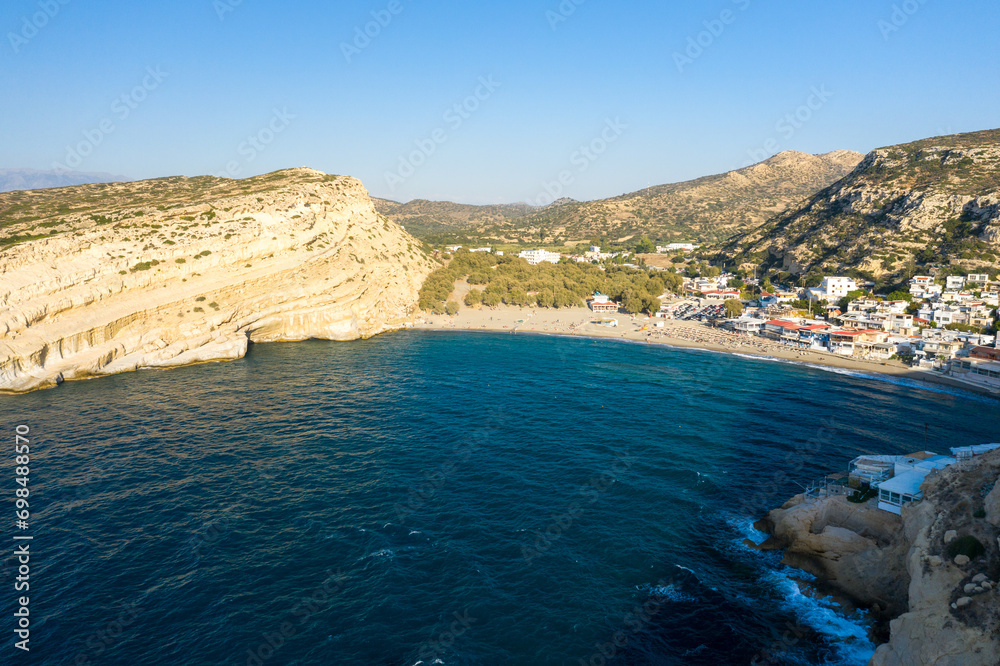 The hippie caves above the sandy beach , in Europe, Greece, Crete, Matala, By the Mediterranean Sea, in summer, on a sunny day.