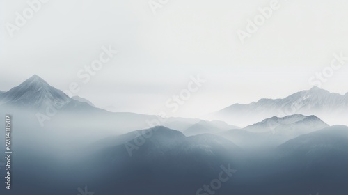 Wallpaper Mural  a black and white photo of a mountain range with fog in the foreground and a hazy sky in the background. Torontodigital.ca