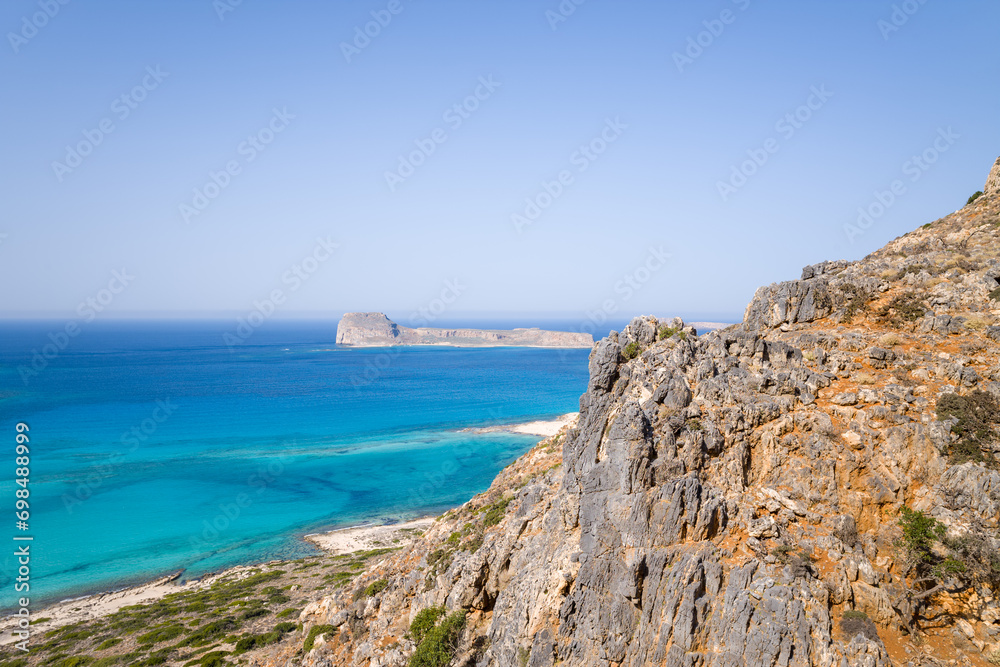 The Venetian castle on its arid rock , in Europe, Greece, Crete, Balos, By the Mediterranean sea, in summer, on a sunny day.