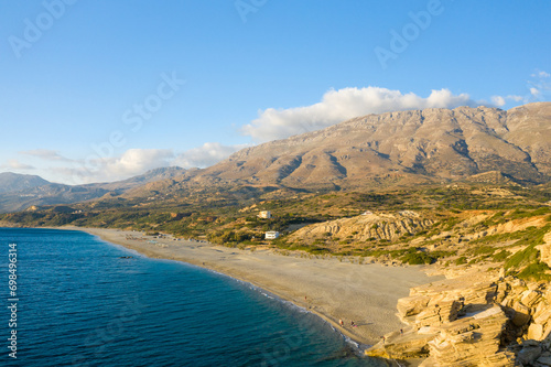 The rocks by Triopetra Beach , in Europe, Greece, Crete, towards Rethymno, By the Mediterranean Sea, in summer, on a sunny day. photo