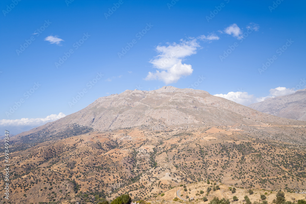 The arid countryside in the south of the island , in Europe, Greece, Crete, towards Preveli, By the Mediterranean sea, in summer, on a sunny day.