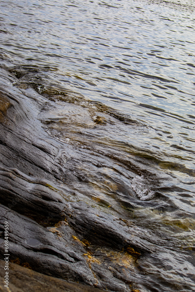 Waves in the water on the coast. Waves in the water on the coast.