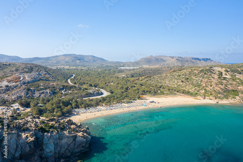 The barren rocky coast and sandy beach of Vai , Europe, Greece, Crete, towards Sitia, By the Mediterranean Sea, in summer, on a sunny day.