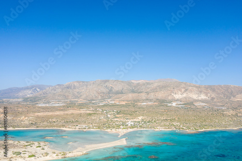 The sandy beach and its heavenly colored water  in Europe  Greece  Crete  Elafonisi  By the Mediterranean Sea  in summer  on a sunny day.